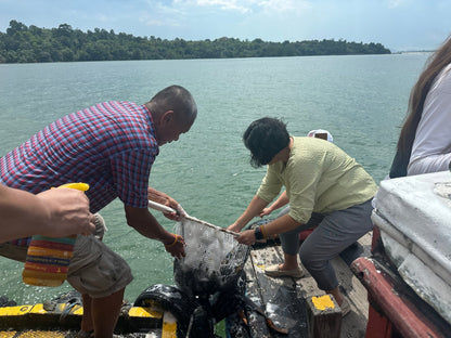 Naga vase offering ceremony at sea, Tashi Gephelling Buddhist Centre