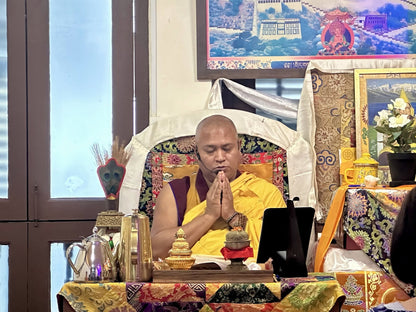 Bise Rinpoche in prayer at the Water Purification Puja